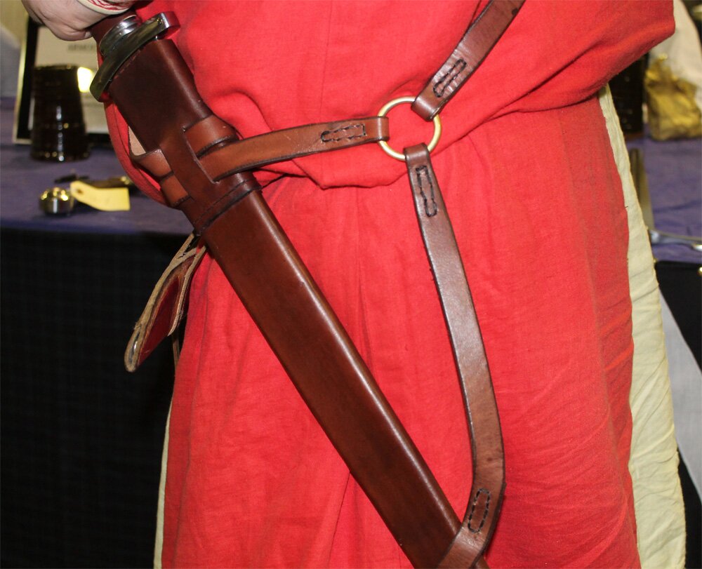 Shoulder baldric, showing sword angled at the hilt. 3 way splitter on a brass ring to attach to the scabbard.